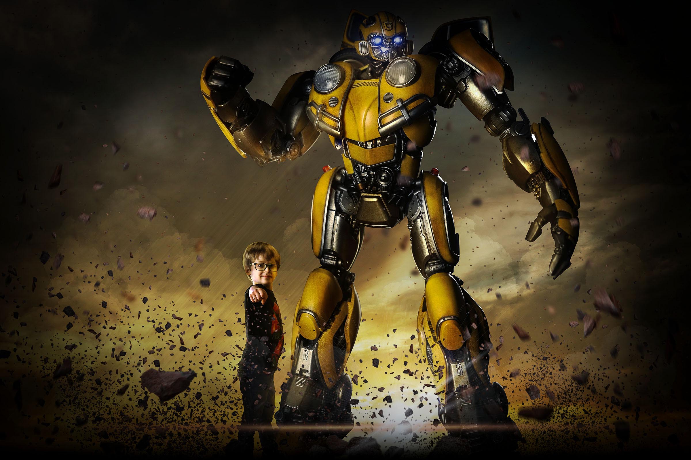 Composite of boy and Transformers Bumblebee action pose with rock explosion by Vaudreuil-Soulanges and West Island of Montreal photographer Tobi Malette